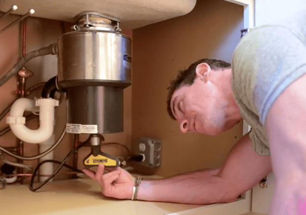 Video: How To Fix A Garbage Disposal